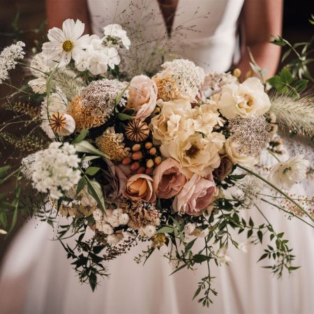 Wild garden gathered bridal bouquet with white and neutral tone flowers