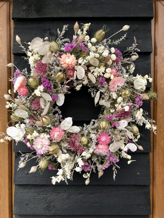 dried flower wreath in shades of pink