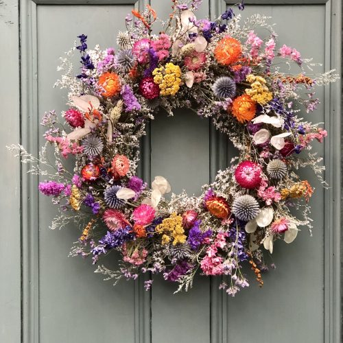 dried flower wreath with bright colourful flowers
