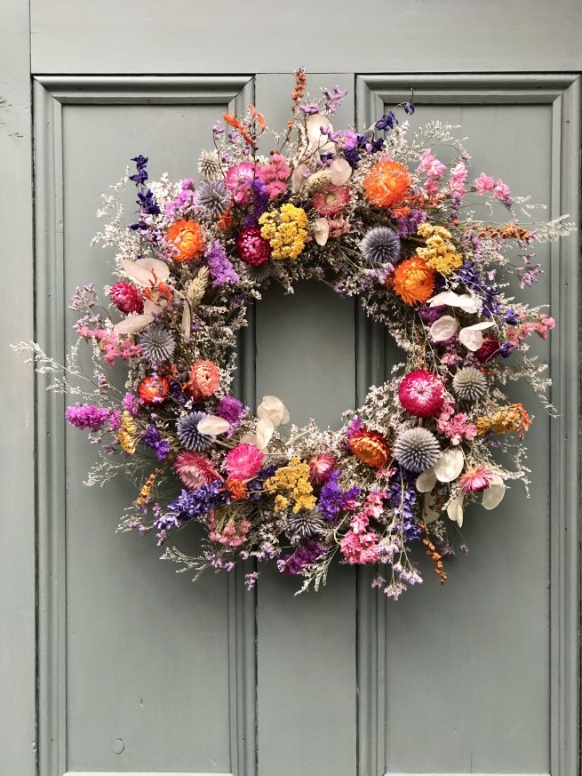 dried flower wreath with bright colourful flowers