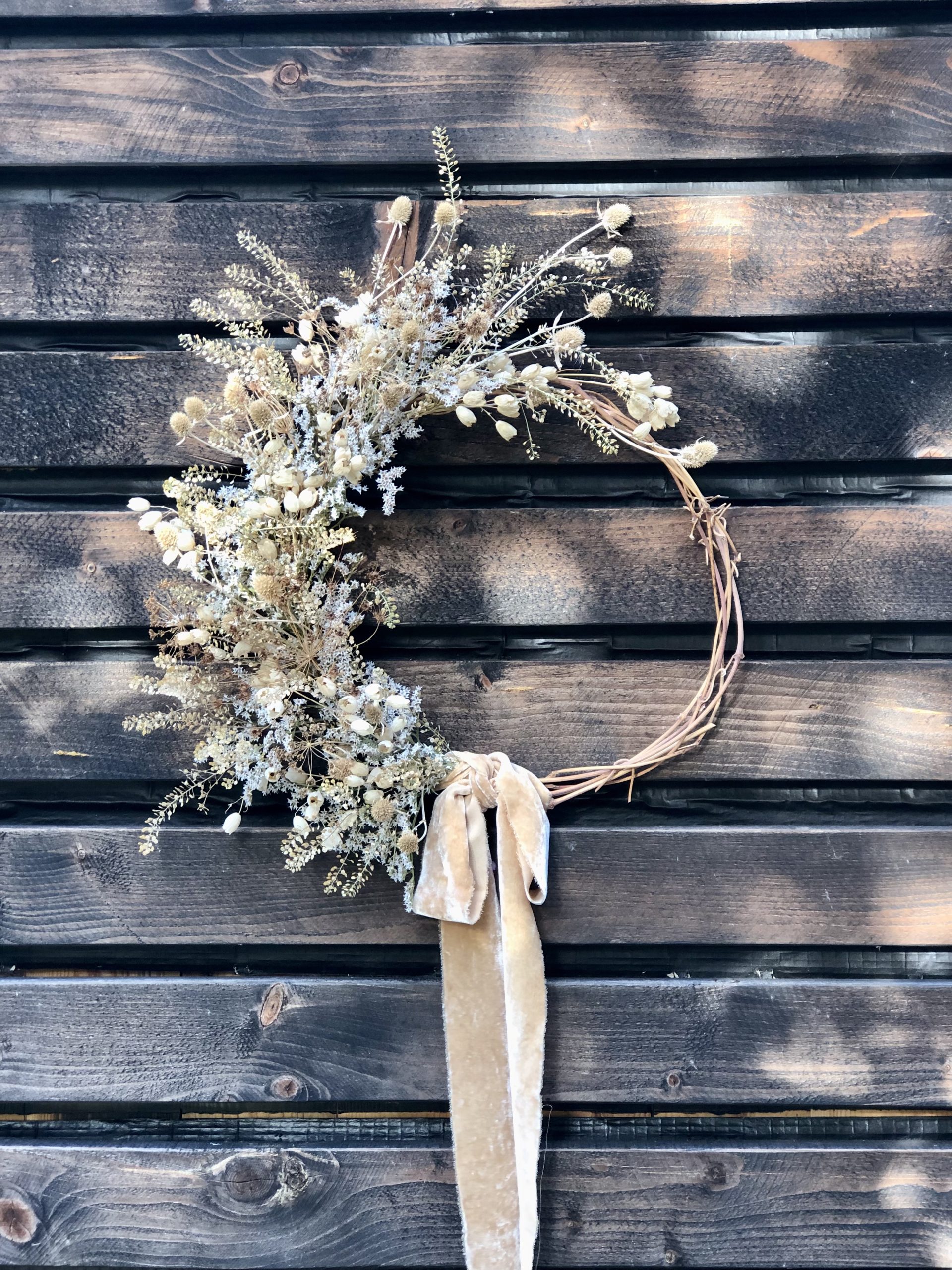 dried flower wreath neutrals with velvet ribbon